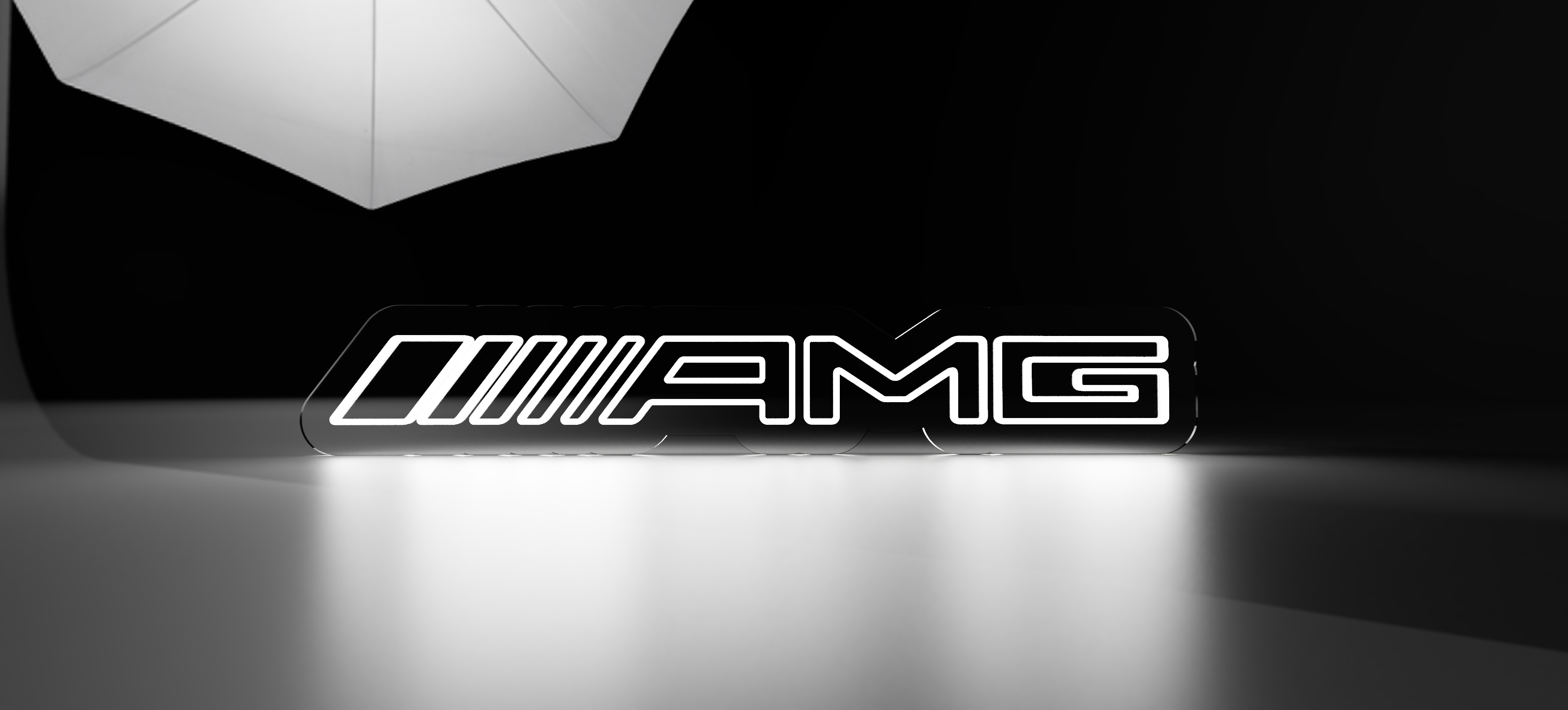 AMG neon led sign displayed in a stylish black background, ideal for decoration and ambiance.